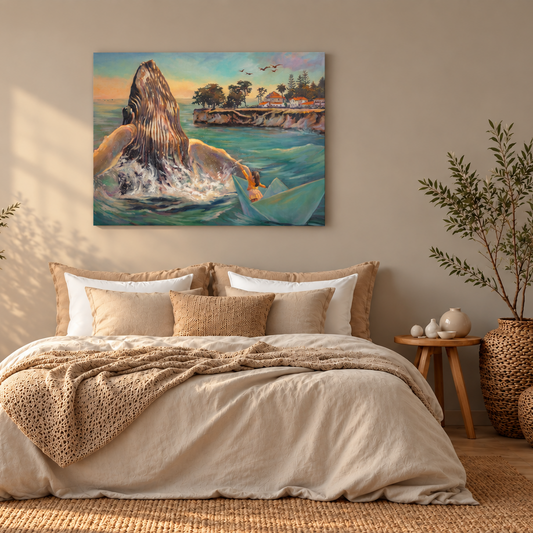 Modern neutral bedroom with the painting Within Reach hanging above the bed, showing a girl in a paper boat reaching toward a breaching whale along the Santa Cruz coast.