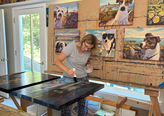 Artist working on a large original oil painting in studio, illustrating the time, materials, and craftsmanship behind fine art pricing.