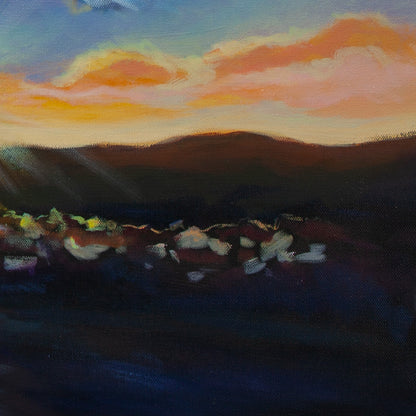 Detail of glowing rocks with reflections and distant hills under orange sunset light from Harbor of Wonders, coastal artwork by Martina Goulart.”