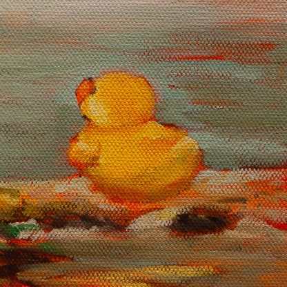 Close-up of a yellow rubber duck with orange beak in warm yellow, orange, and brown tones from Shoreline Company by Martina Goulart.