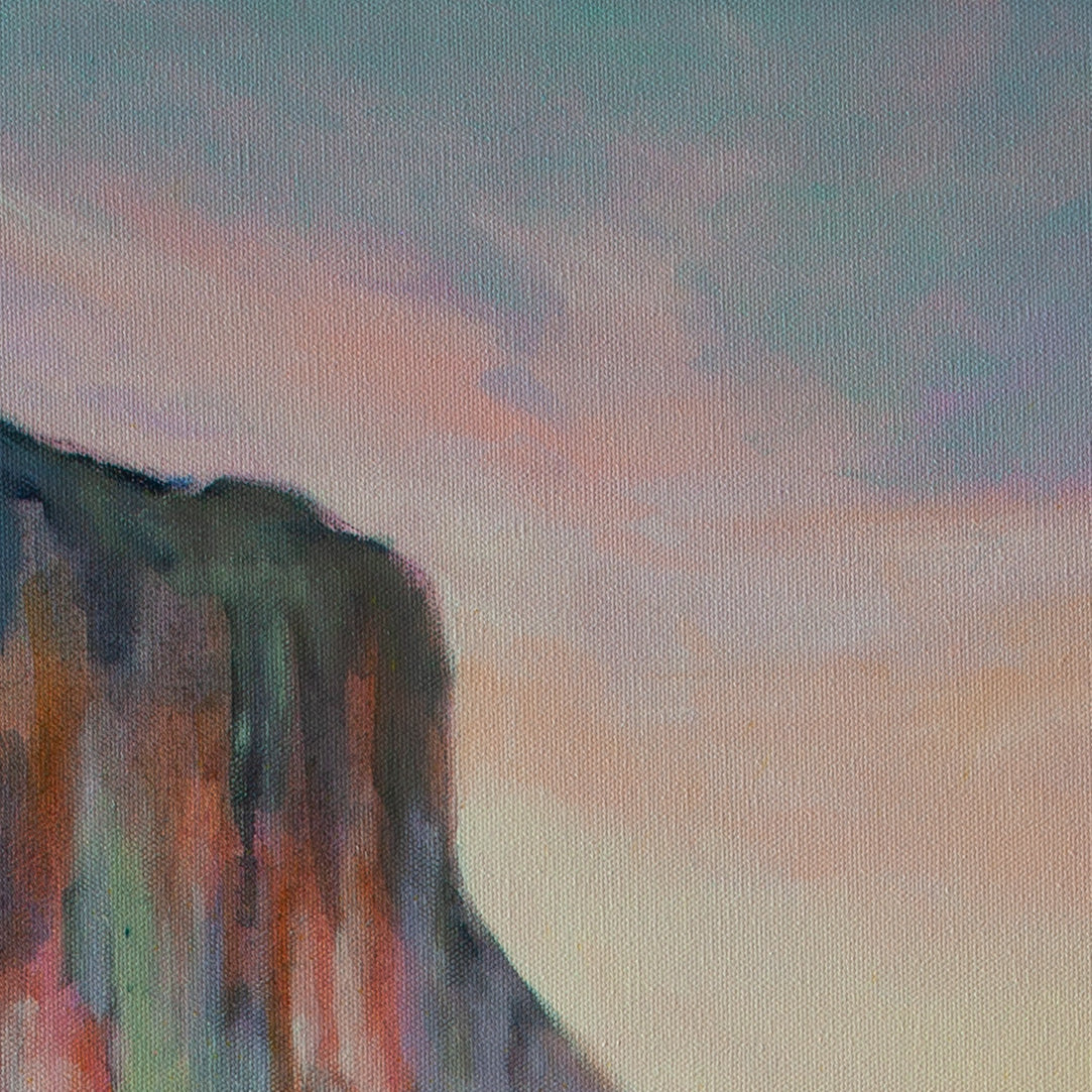 Close-up of El Capitan’s top in dark blue, pink, and orange hues under soft yellow-blue sky from One Day, El Cap., Yosemite artwork.