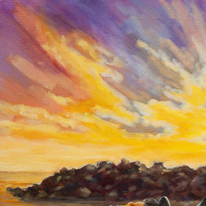 Close-up of warm yellow and purple sunset clouds above dark harbor rocks from the Santa Cruz coastal painting Paddle Pals.