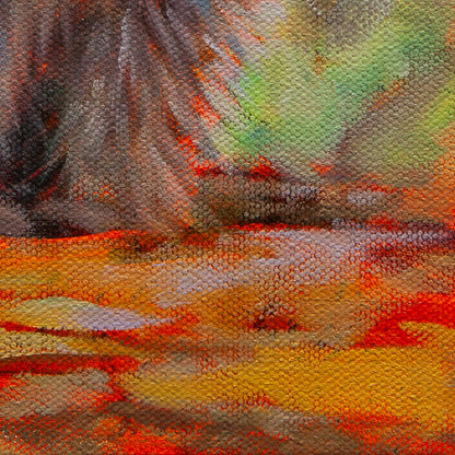 Close-up of a raccoon’s front paw on a yellow-orange rock with green forest in the distance from Night Watch by Martina Goulart.”