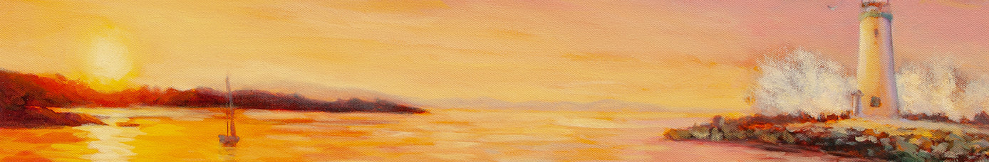 Lighthouse on an island with a sunset over water