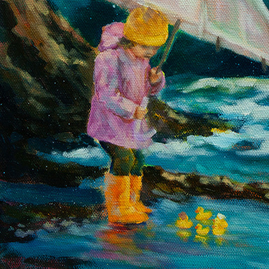 Close-up of a girl shielding small rubber ducks in a pool with a brown cliff and ocean water in the background.