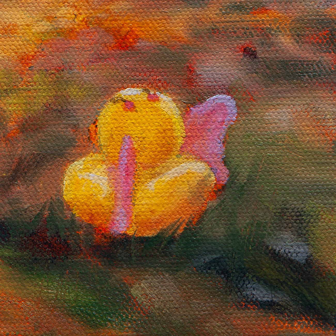 Close-up of a yellow-orange rubber duck with pink wings resting in golden grass under sunlight from Curious Exchange by Martina Goulart.