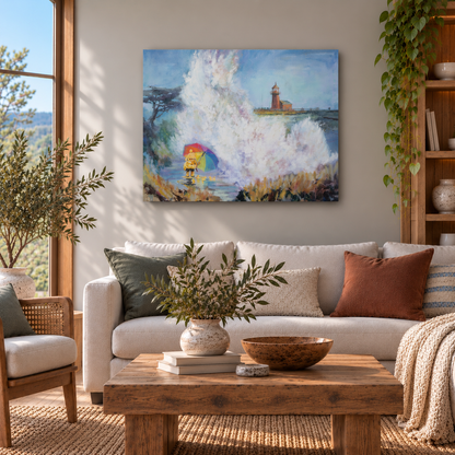 “Splash Zone” original oil painting by Martina Goulart, featuring a child with a colorful umbrella beneath crashing ocean waves near a Santa Cruz lighthouse, displayed above a cream sofa in a modern coastal living room.