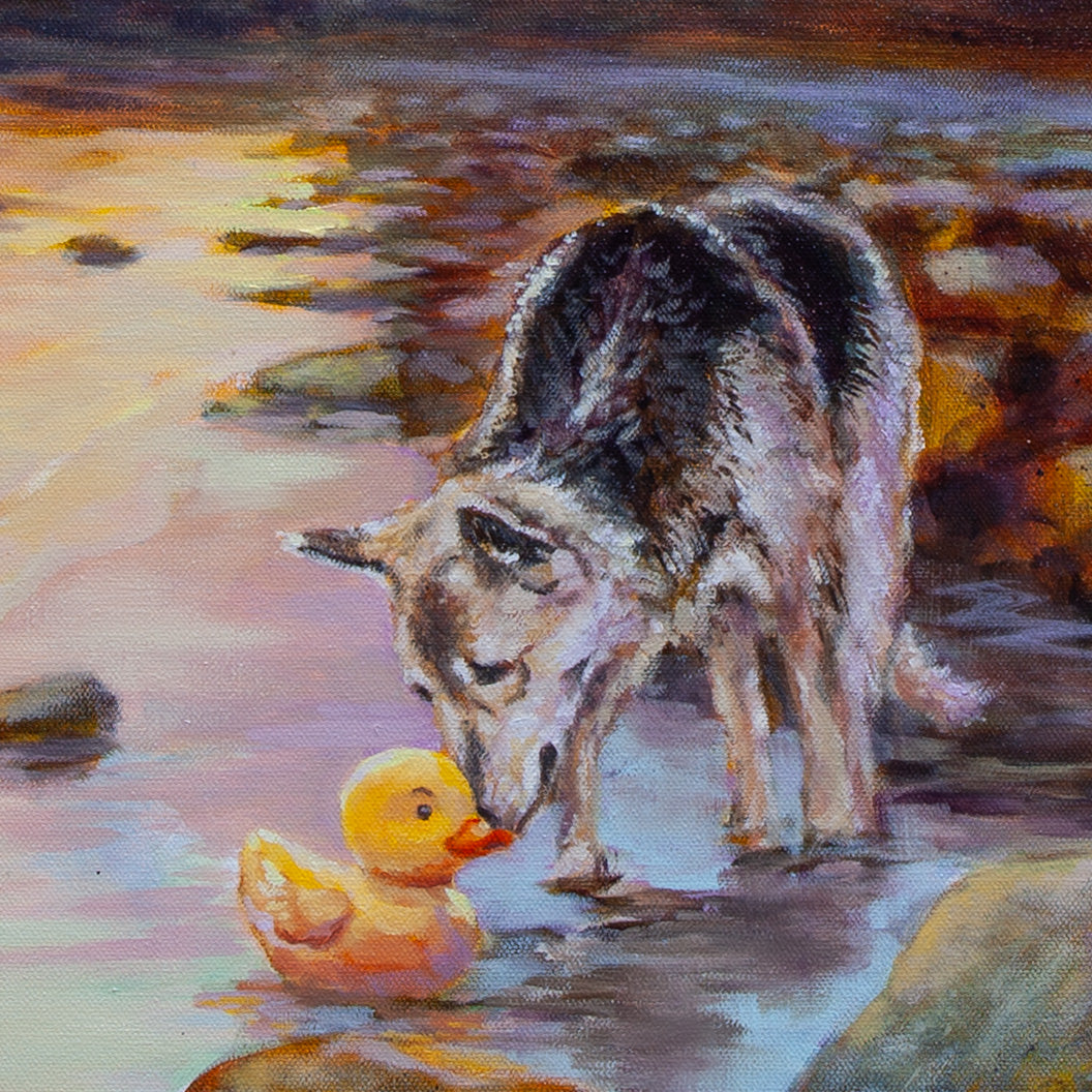 Close-up of tan dog sniffing yellow rubber duck by brown rocks with soft light reflections on the water from The Duck, the Dog, and the Sea.