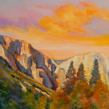 Detail of mountain peak under orange sky with purple touches and treetops of green and orange-green from The Peace of Play, Yosemite artwork.