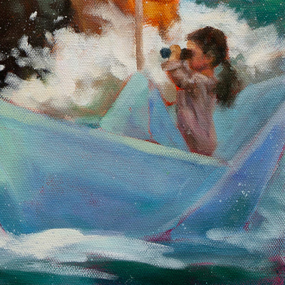Close-up of a brown-haired girl in a tan sweater sitting in a blue paper boat, looking through binoculars at the sea.