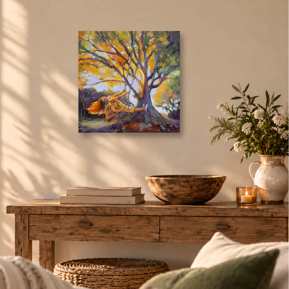 A square print of Weightless hangs on a warm beige wall above a rustic wooden console table. Soft sunlight, books, a wooden bowl, flowers, and cozy furnishings surround the colorful artwork.