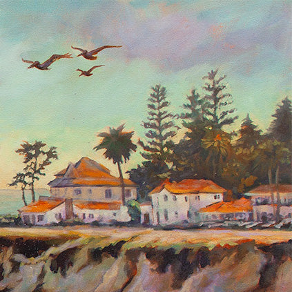 Close-up of coastal houses, palm trees, and flying birds along the Santa Cruz cliffs from the painting Within Reach.
