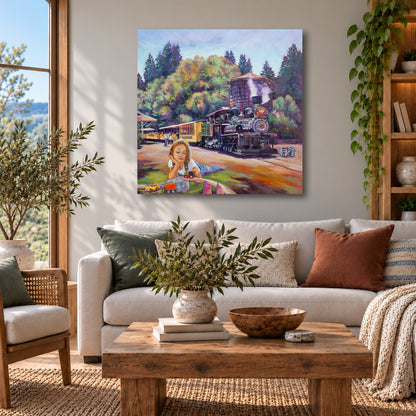 “Adventure Line” original painting by Martina Goulart, featuring a young girl playing with toy trains beside a historic steam locomotive at Roaring Camp in the Santa Cruz Mountains, displayed above a cream sofa in a cozy modern living room.