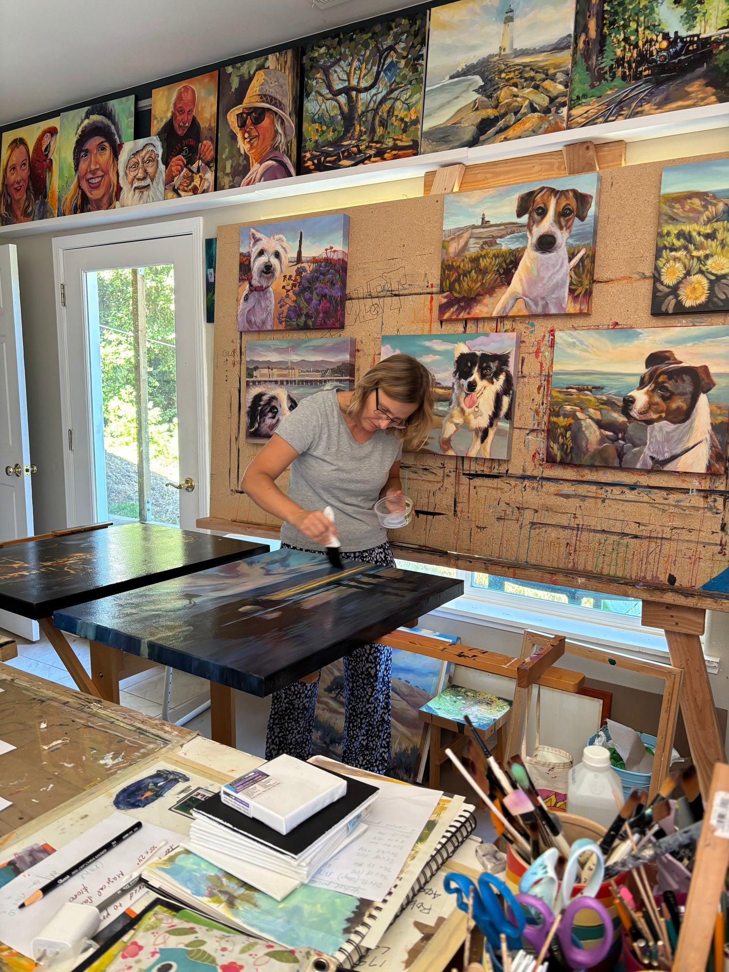 Artist Martina Goulart working in her studio in Felton.