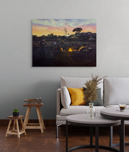 Painting Where the Night Begins hanging above a light modern couch with pillows, glass vase on coffee table, and two stools in a cozy living room.