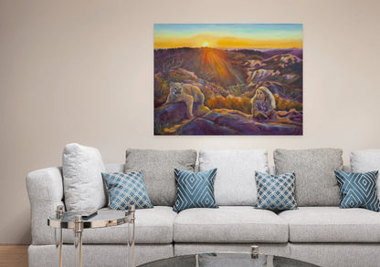 Original painting of a girl and mountain lion at sunset with glowing purples and oranges, hanging above a light gray sofa and glass coffee table