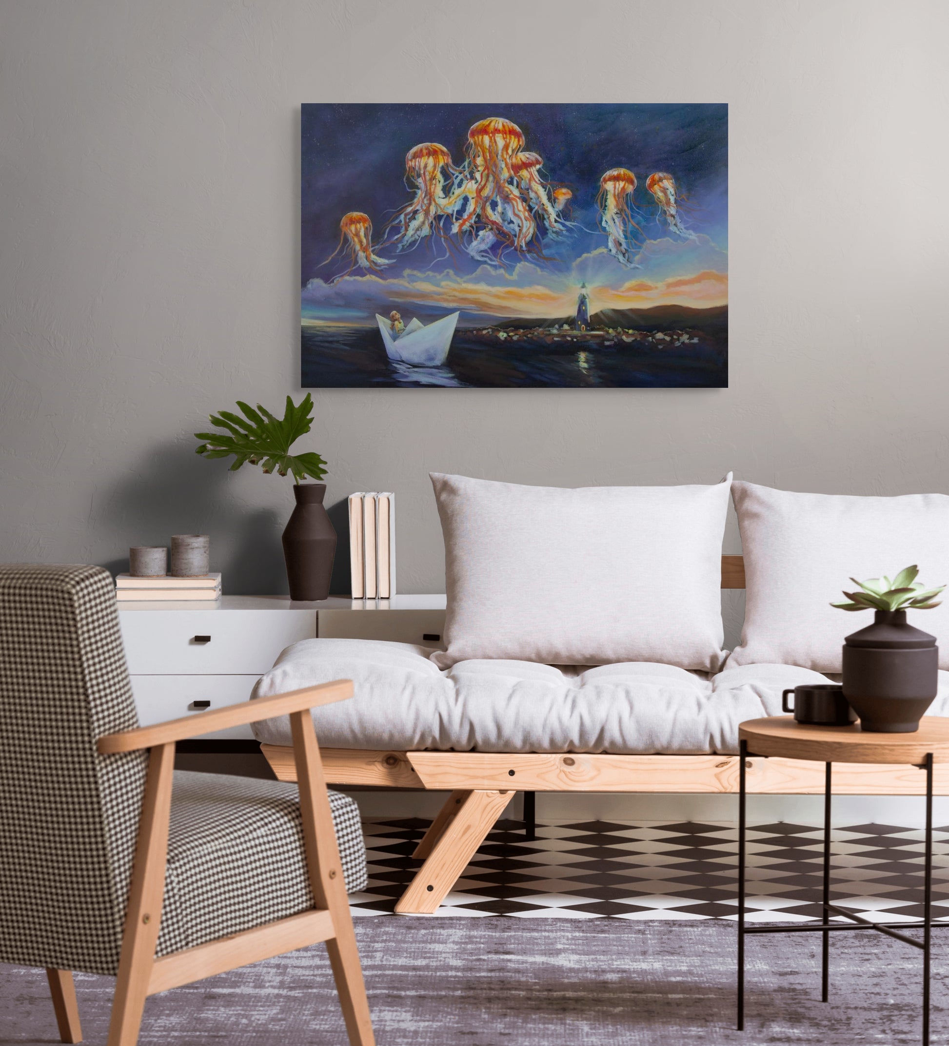 Original painting of red and yellow jellyfish above a girl in a paper boat entering Santa Cruz Harbor, hanging in a living room with a sofa and chair