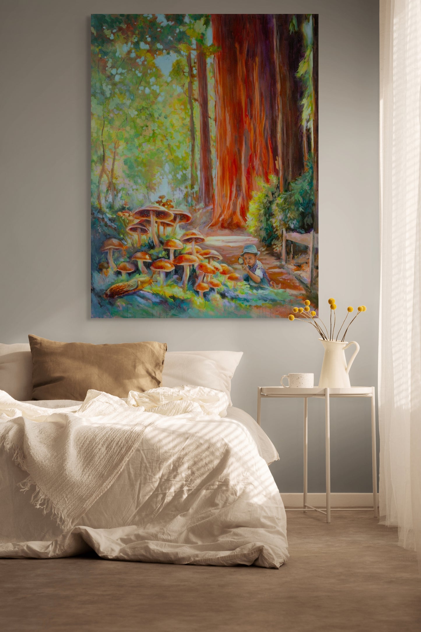 Original painting in a bedroom featuring a forest scene with mushrooms and a boy in a hat beneath a tall redwood, in warm orange and green tones.