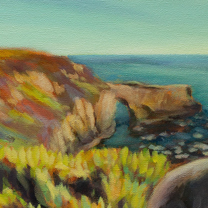 Detail of the coastal cliff arch, ocean, and plants in the foreground from Picture Perfect, a Santa Cruz coastal dog painting.