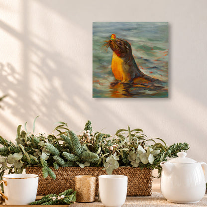 Colorful oil painting of a playful sea lion holding a small orange flower in its mouth while swimming in the ocean, displayed above a wooden dining table in a warm, sunlit coastal home with natural greenery, woven textures, and soft neutral decor.
