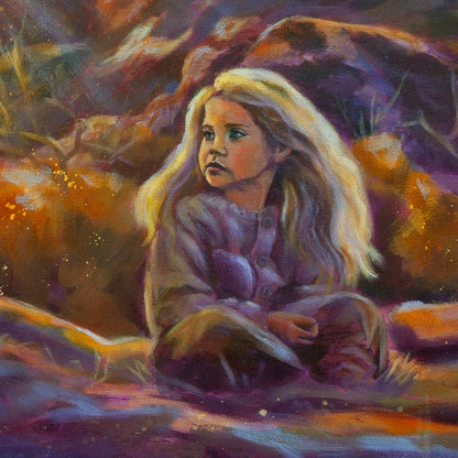 Close-up of girl with soft light in blond hair sitting among orange and purple rocks from Belonging, California landscape artwork.