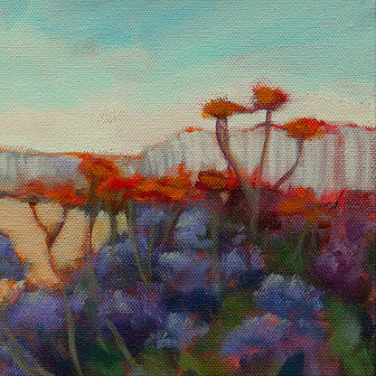 Close-up of red and purple flowers with sandy walkway, rail, and bright blue sky from Surfer’s Best Friend, a Santa Cruz coastal painting.