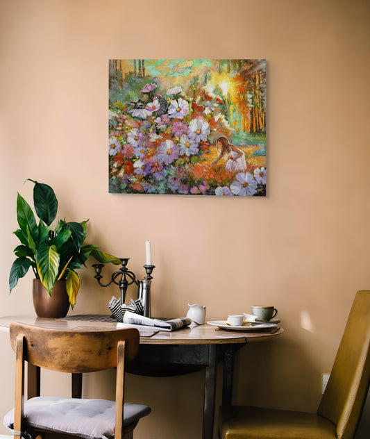 Original floral landscape painting displayed above a dining table in a warm, modern interior, showing a girl in a garden surrounded by vibrant flowers.